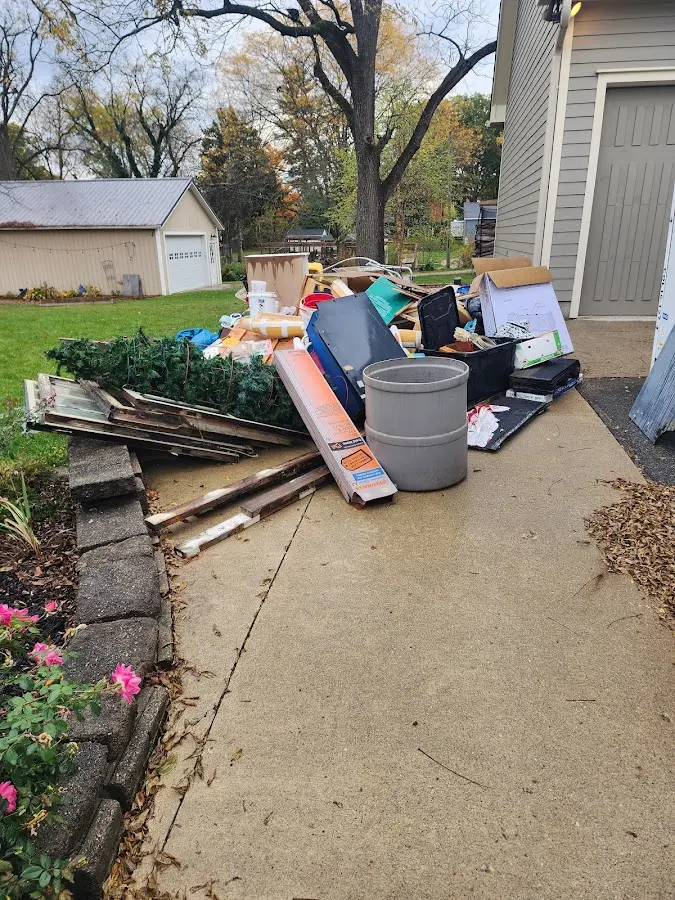 Dumpster being loaded with debris for 3 Yard Dumpster Rental in Newburgh